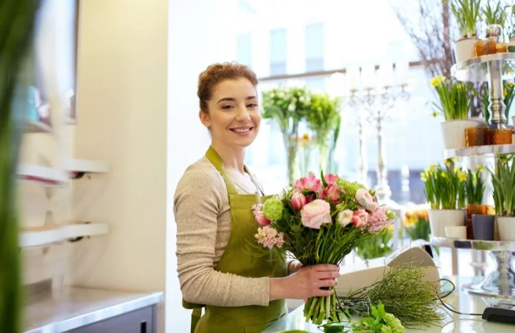May promotional ideas - woman in a flower shop