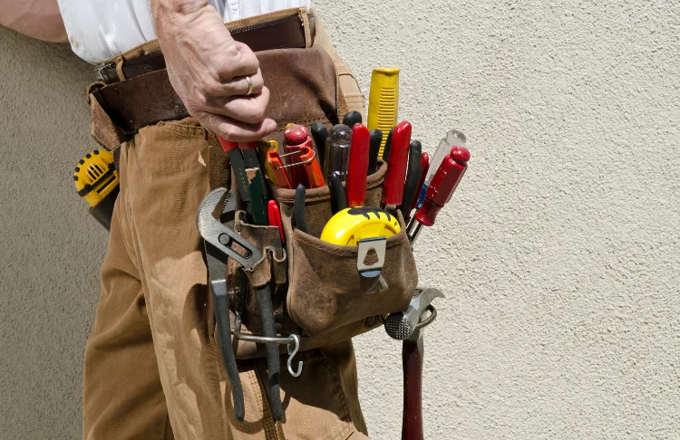Handyman marketing - person wearing a tool belt.