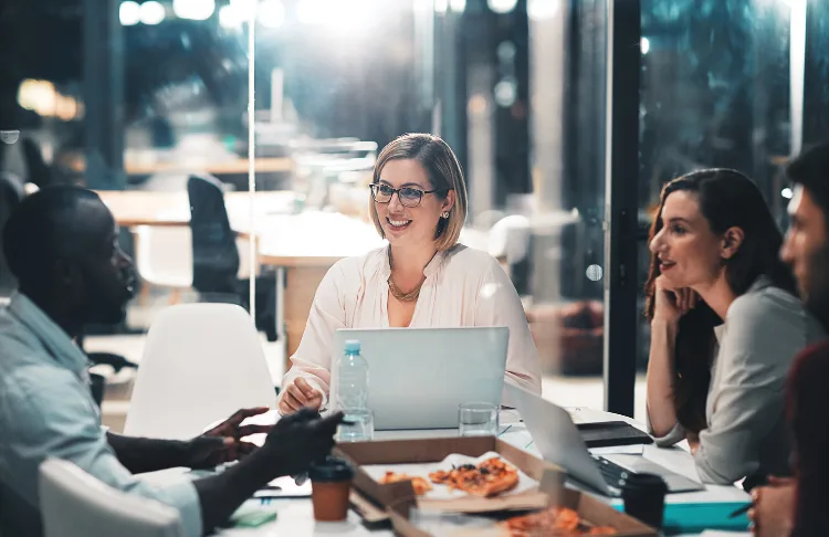 Types of marketing agencies - group of professionals working at a table.