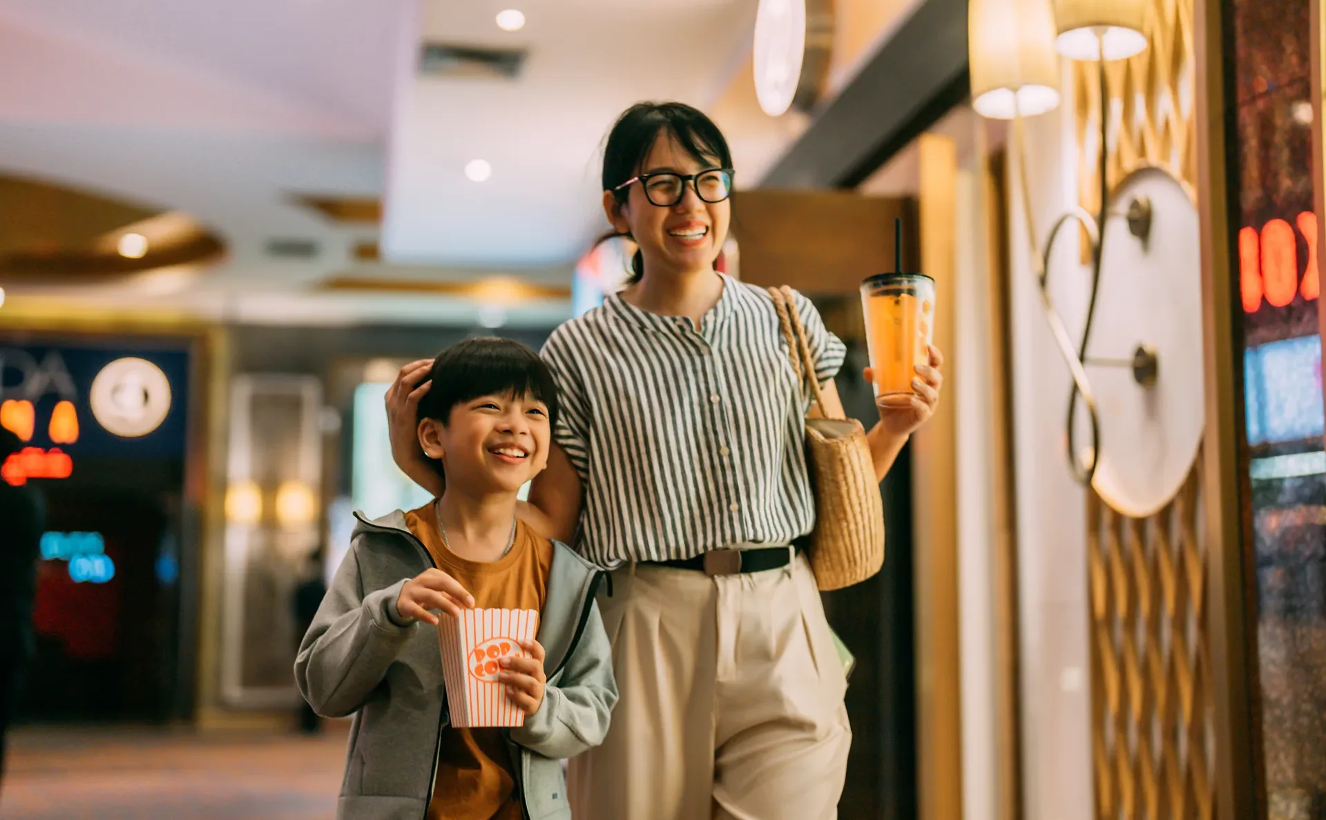 mother and son go to see a movie