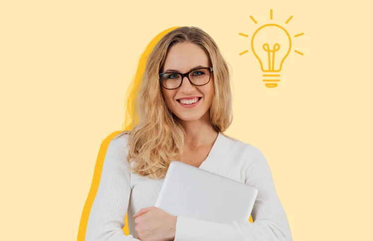 Marketing strategies from the pros - woman holding a laptop